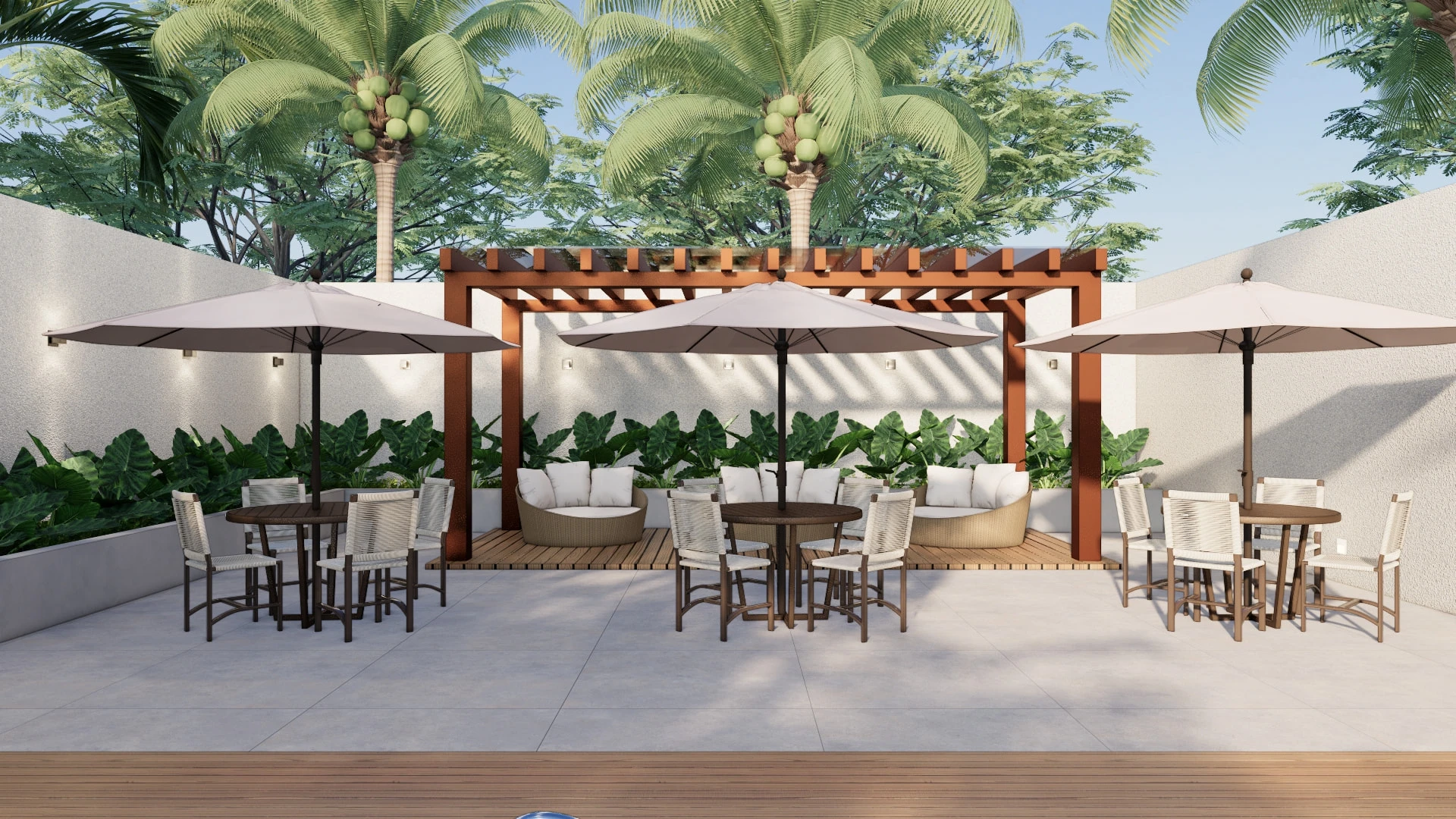 Pergolado com lounge ao lado da piscina do Enseada Exclusive, Praia da Enseada, Guarujá